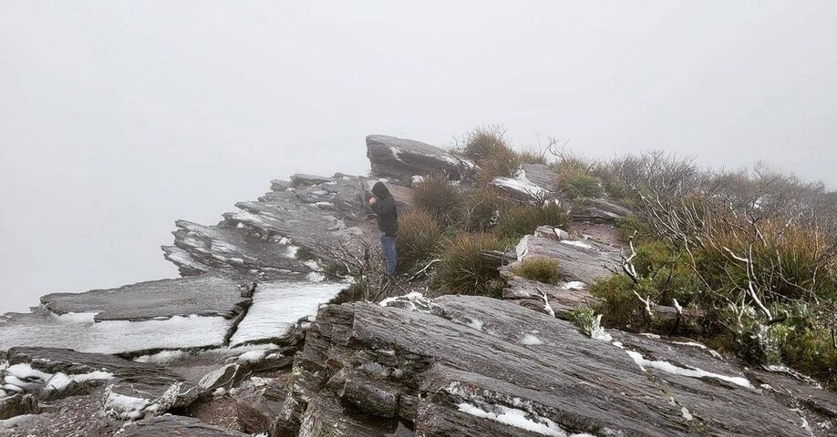 Image: A light dusting of snow from a previous fall at the summit of Bluff Knoll. Source: @bibbulmun on Instagram