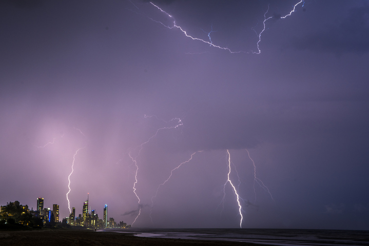 Rain and thunderstorms spread across NSW and Queensland